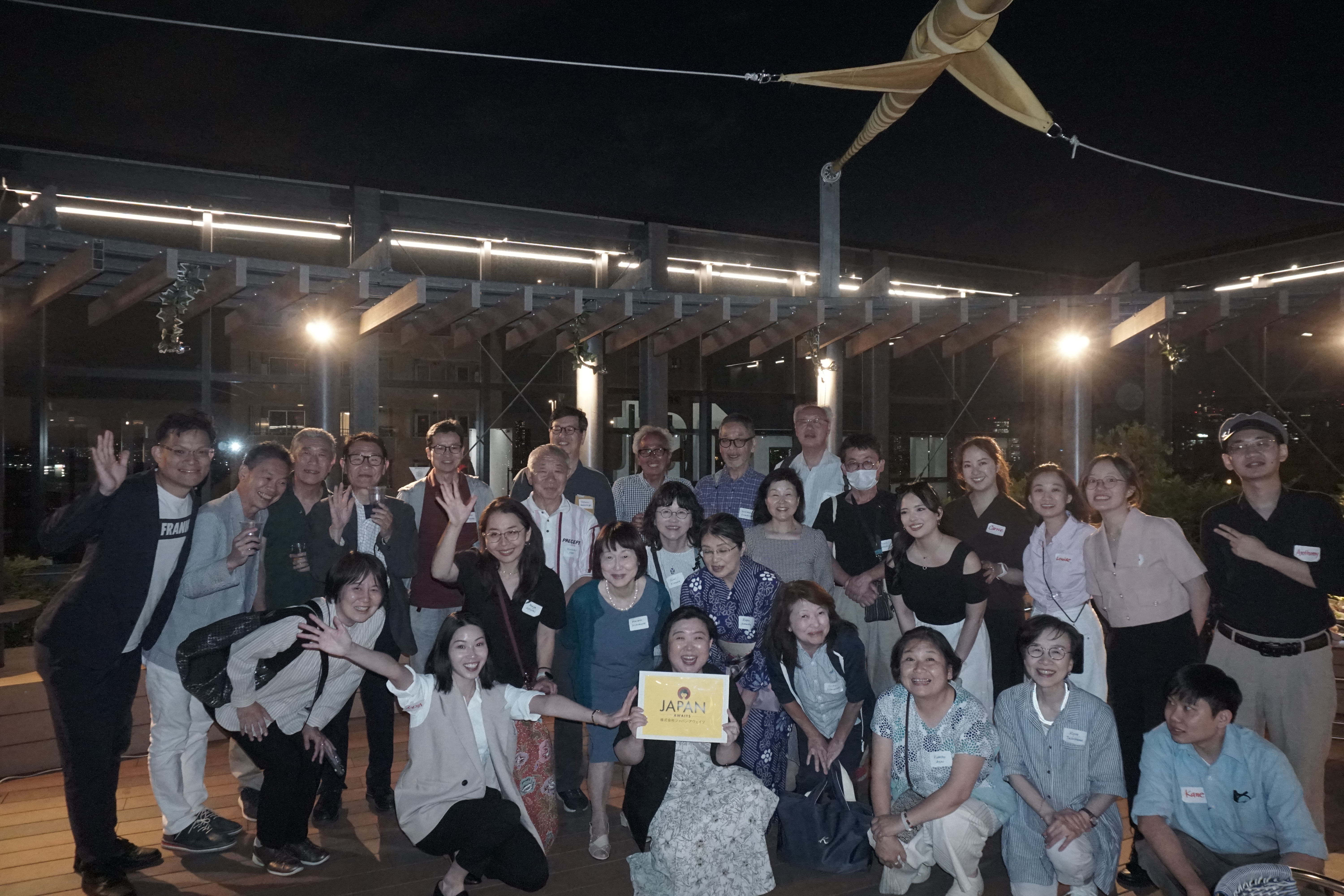 Japan Awaits tour guides and team members gathering in Japan